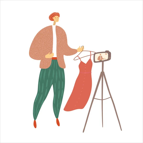 Een man die een video opneemt voor blog. Fashion blogger maken inhoud voor volgers. Stylist geeft advies voor de camera. Cartoon vector karakter — Stockvector