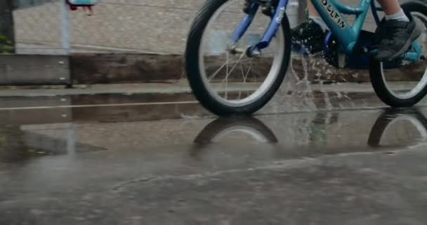 Child Bicycle Ride Puddle Water Closeup Bike Urban Environment Children — Stock Video