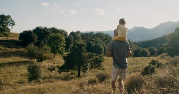 Young Adult Man Holding His Daughter Hike Travel Mountain Summer — Vídeo de stock