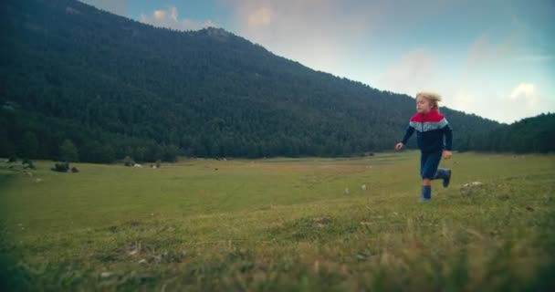 Happy Carefree Child Boy Run Mountain Meadow Rubber Boots Rainy — Video Stock