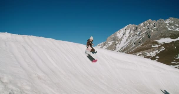 Two Children Winter Vacation Trip Roll Snow Slide Asses Epic — 图库视频影像