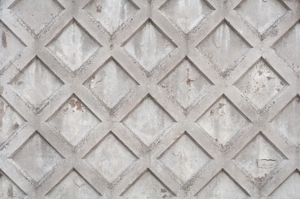 Fragmento de vieja pared agrietada con patrón de diamante y armadura —  Fotos de Stock