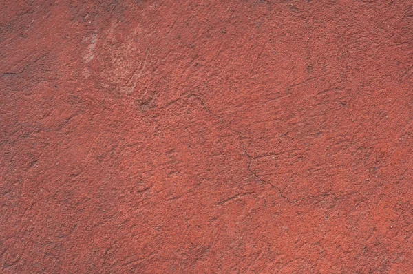 Fragment d'un vieux mur avec plâtre rayé rouge — Photo