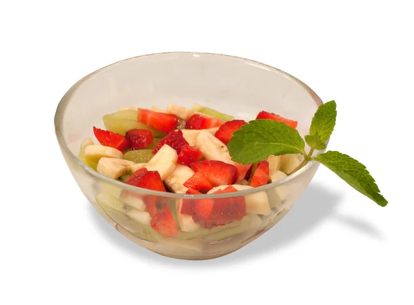 Fruit salad in glass bowl isolated — Stock Photo, Image