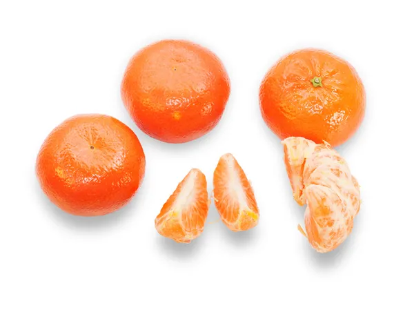 Several tangerines, one purified and separated into segments iso — Stock Photo, Image