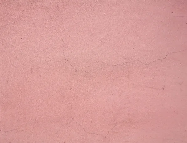 Textuur van gebarsten muur roze — Stockfoto