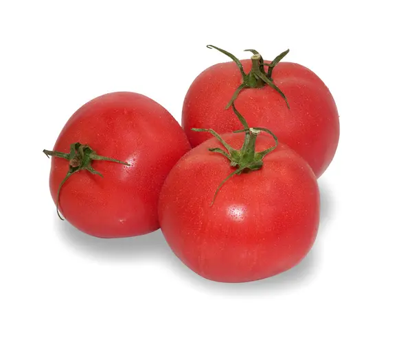 Tres tomates rojos maduros aislados — Foto de Stock