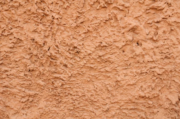 Kabartma doku kahverengi çimento duvar — Stok fotoğraf