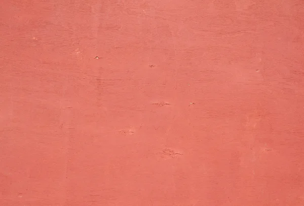 Texture of  plywood covered with pink paint chips — Stock Photo, Image