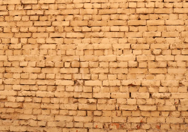 Текстура старой стены из желтого кирпича — стоковое фото