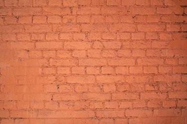 Texture della vecchia parete di mattoni rossi, dipinta in rosso — Foto Stock