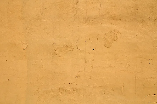 古老的墙划伤的膏黄的纹理 — 图库照片