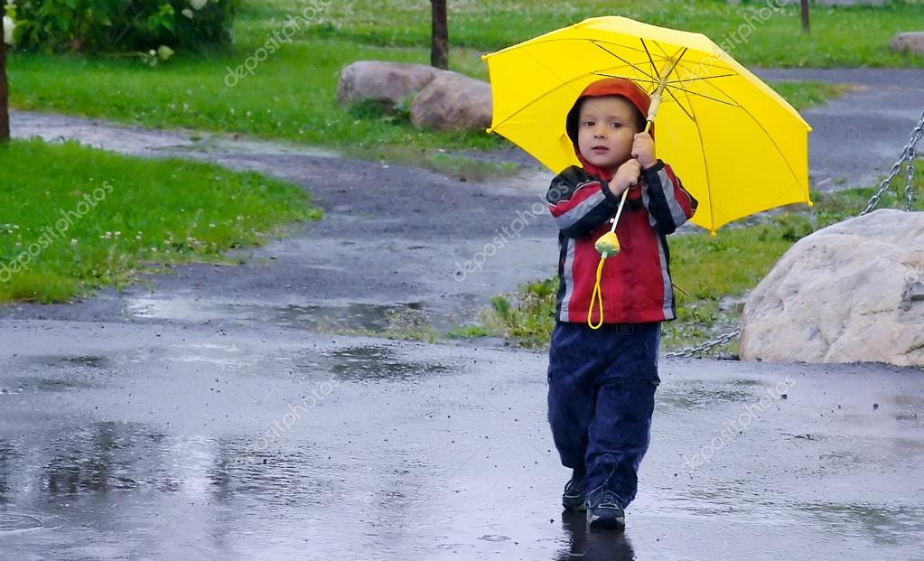 Playing in the rain — Stock Photo © talanis 22477039