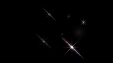 Animation white light sparkles on black background. 