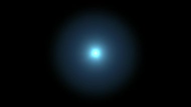 Realistic light lens flare on black background. 