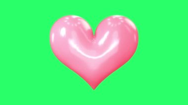 Animation pink heart shape isolate on green background.