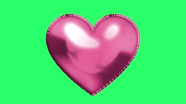 Animasyon pembe balon kalp şekli yeşil arka planda yüzüyor.
