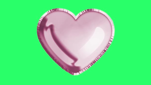 Κινούμενα Σχέδια Ροζ Μπαλόνι Σχήμα Καρδιάς Επιπλέουν Πράσινο Φόντο — Αρχείο Βίντεο
