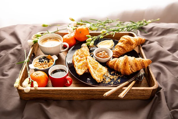 Continental Breakfast Rustic Wooden Tray Bed Grey Sheets Coffee Croissants — Stock Photo, Image