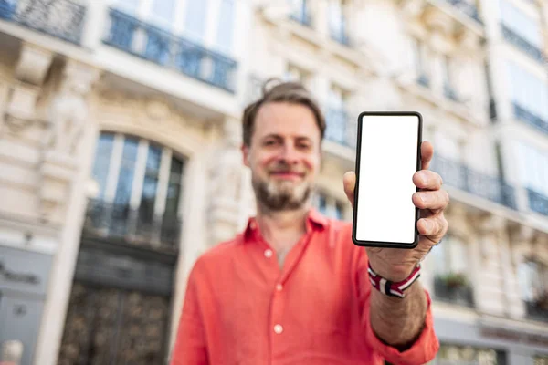 Happy Caucasian Man Businessman Showing His Smartphone Elegant Street Blank — Stock fotografie