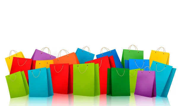 Fondo con bolsas de compras de colores. Concepto de descuento. Vector — Archivo Imágenes Vectoriales