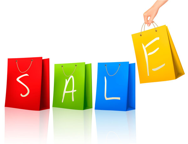 Покупка цветных пакетов с SALE на них. Концепция скидки. V
