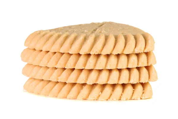 Stack of four pieces of shortbread over white background — Stock Photo, Image