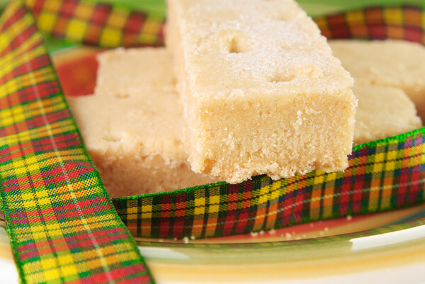 Three shortbread fingers with tartan ribbon