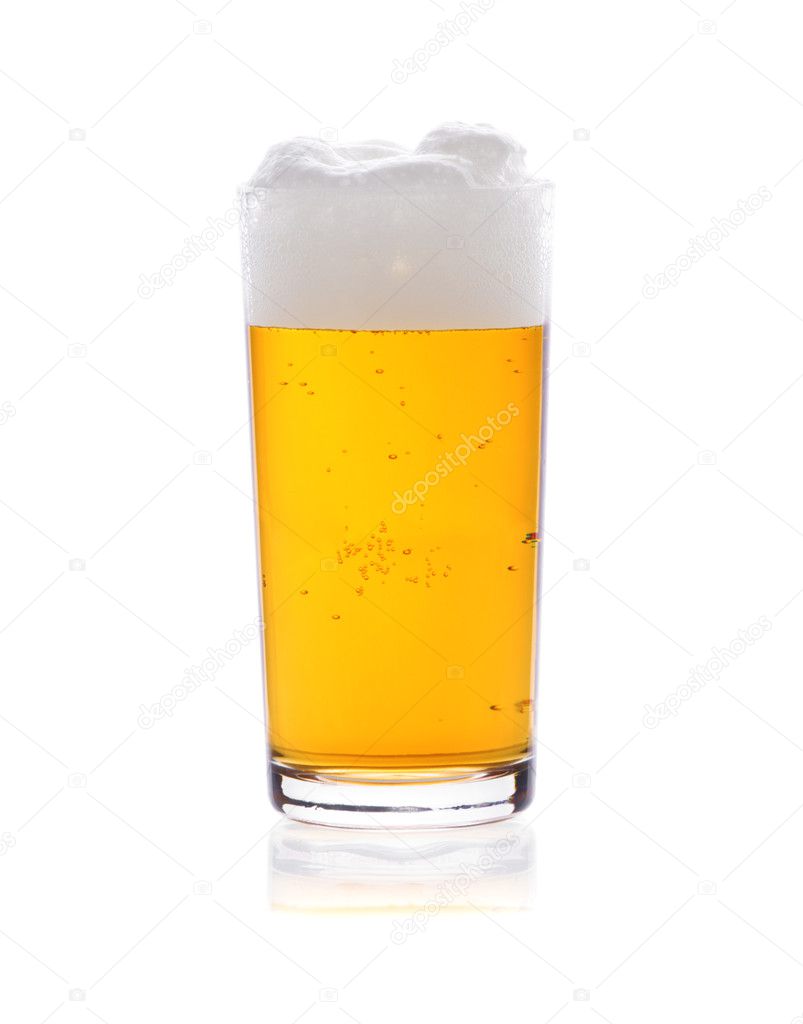 Glass of beer with froth isolated on white