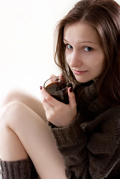 Young woman with a cup of coffee — Stock Photo, Image