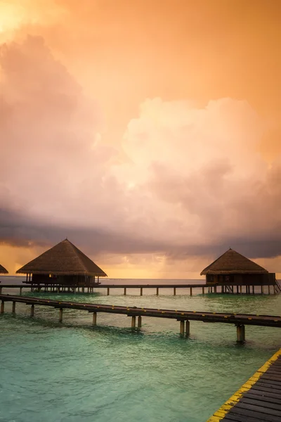 Over water bungalows with steps into amazing green lagoon — Stock Photo, Image