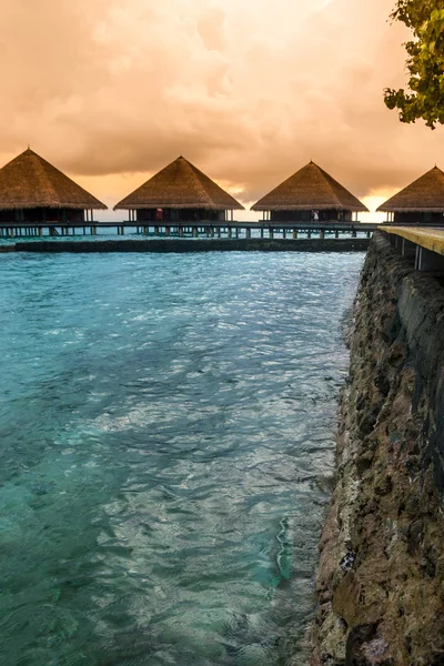 View of water villas resort on a Maldives island, shot with a tilt and shift lens — Stock Photo, Image