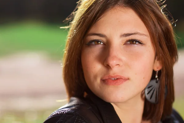 Portrait of young beautiful woman on green background summer nature. — Stock Photo, Image