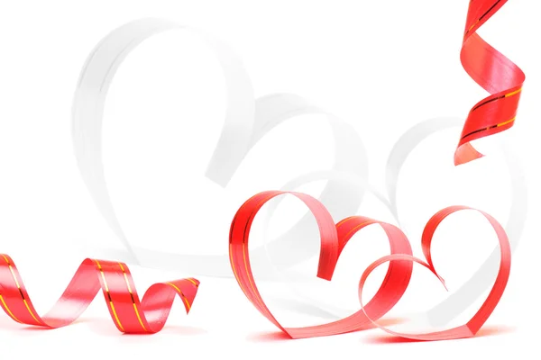 Ribbons shaped as hearts on white, valentines day concept — Stock Photo, Image