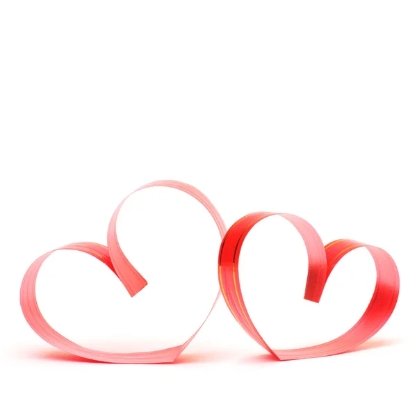 Ribbons shaped as hearts on white, valentines day concept — Stock Photo, Image