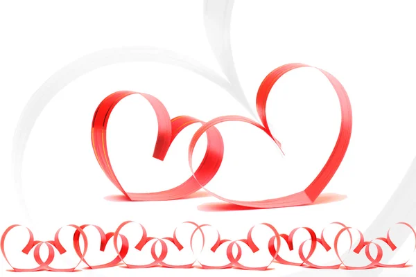 Стрічки у формі сердець на білому, концепція дня Святого Валентина — стокове фото