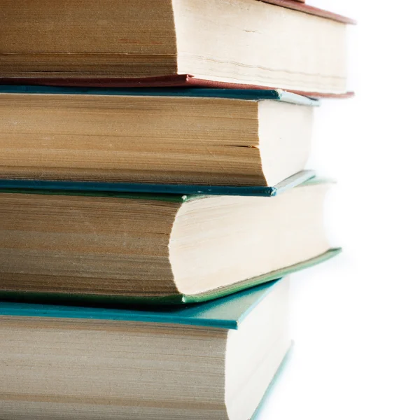 Pila de libros antiguos aislados en blanco — Foto de Stock