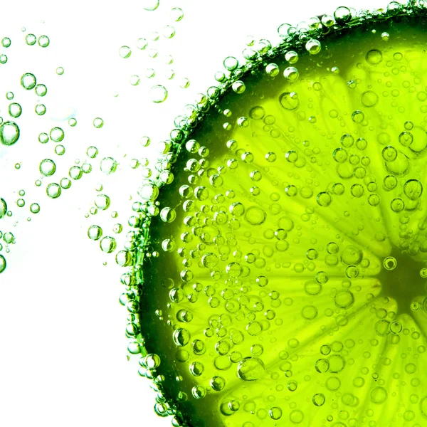 Lime with bubbles isolated on white — Stock Photo, Image