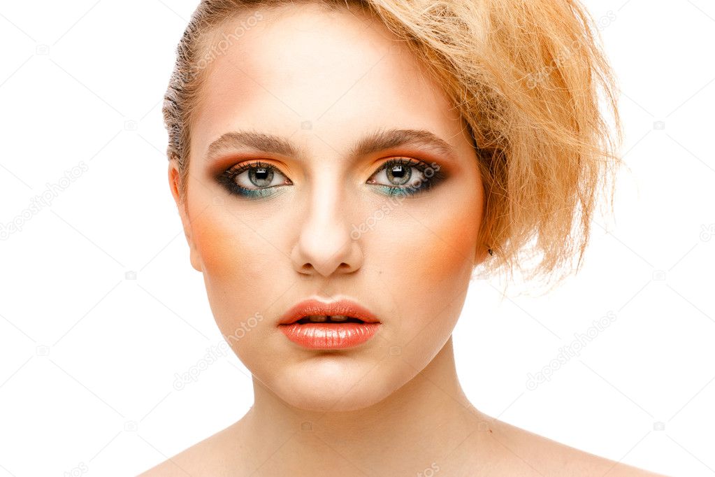 Portrait of beautiful young blond woman with clean face.  High key shot.