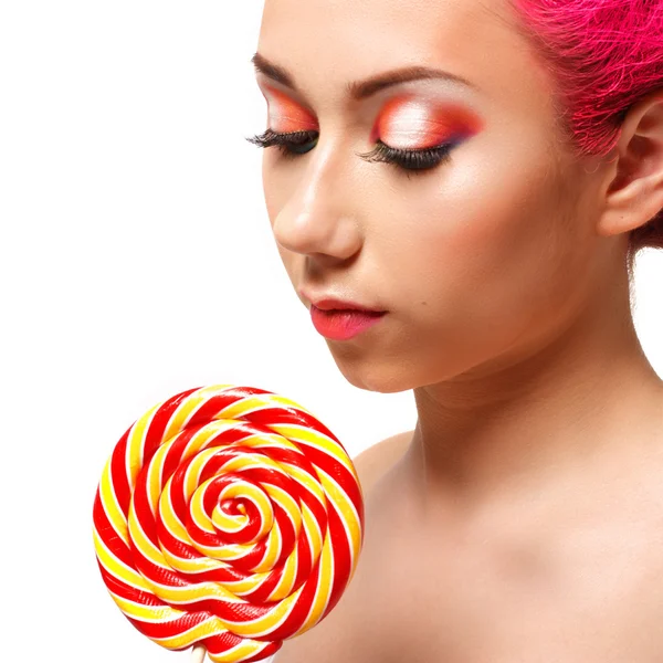 Donna lecca caramelle — Foto Stock