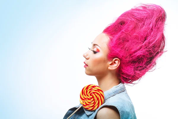 Woman licks candy — Stock Photo, Image