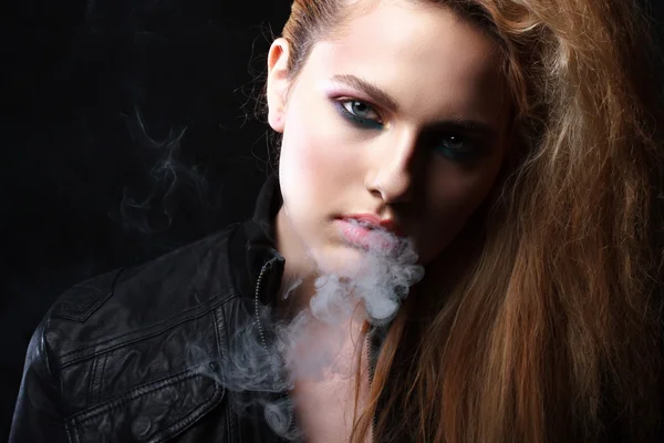 Woman with smoke — Stock Photo, Image