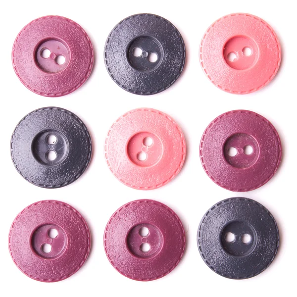 Розовые и фиолетовые кнопки — стоковое фото