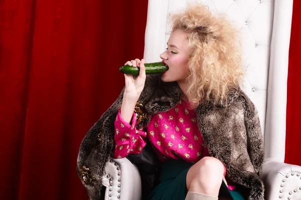 Princess woman in fur coat sitting on throne — Stock Photo, Image