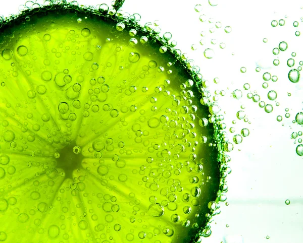 Lime Slice in Clear Fizzy Water Bubble — Stock Photo, Image