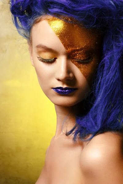 Portrait of young woman in superhero cosmetics — Stock Photo, Image