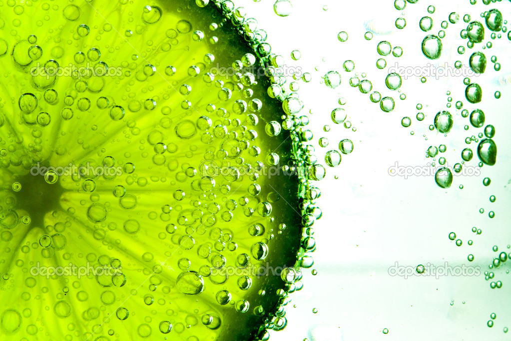 Green lime with water splash