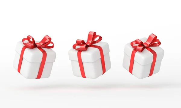 Білі подарункові коробки з червоною стрічкою на білому тлі. 3D візуалізація Ліцензійні Стокові Зображення