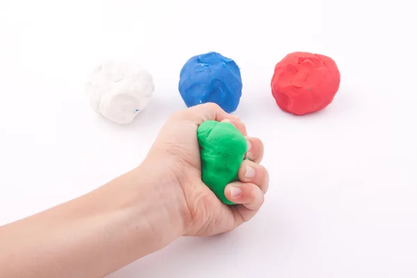 Plasticine and hand — Stock Photo, Image