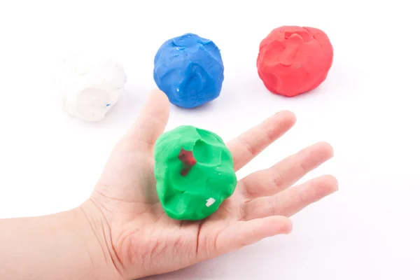 Plasticine and hand — Stock Photo, Image